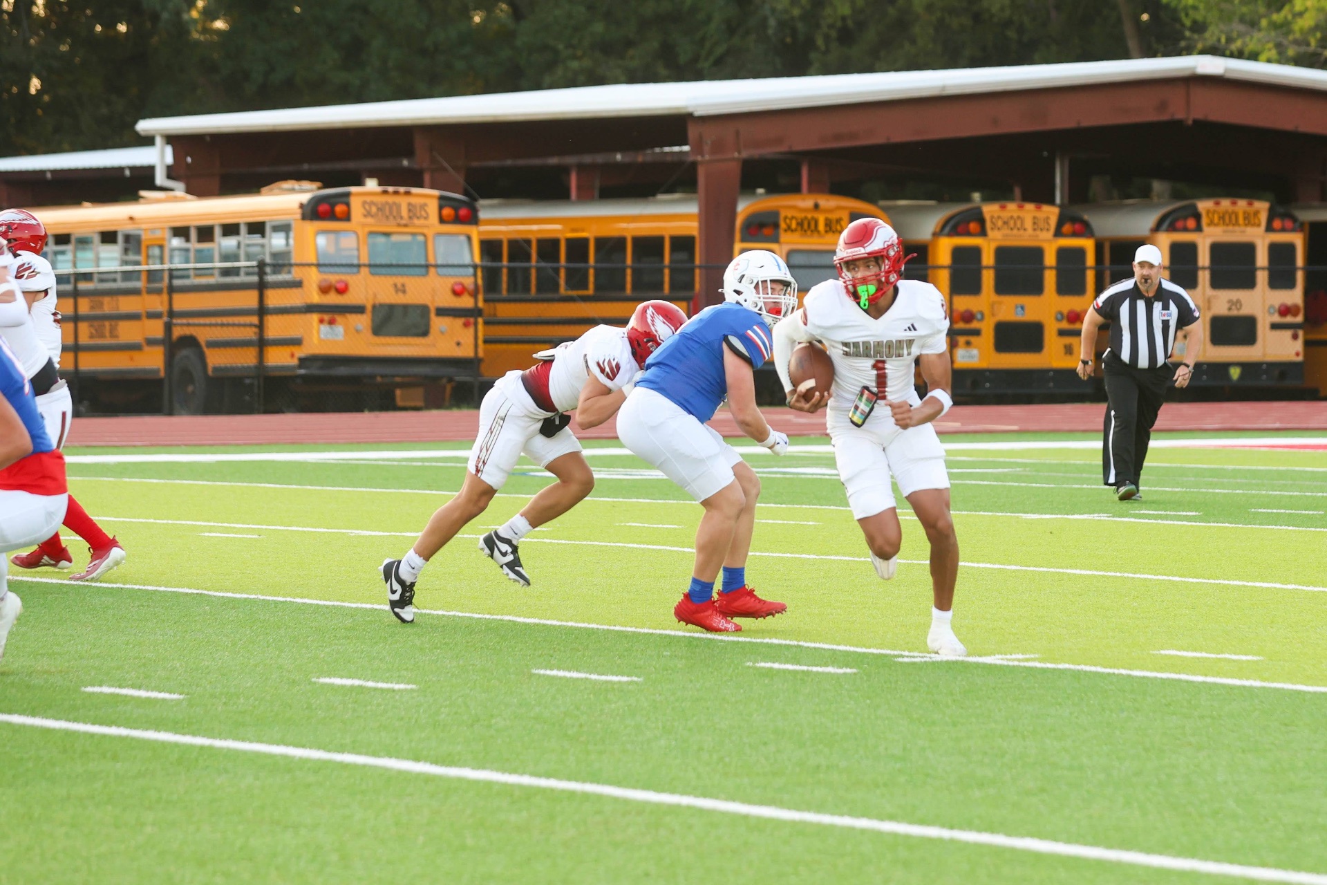 Jordan Escalante running the ball at quarterback